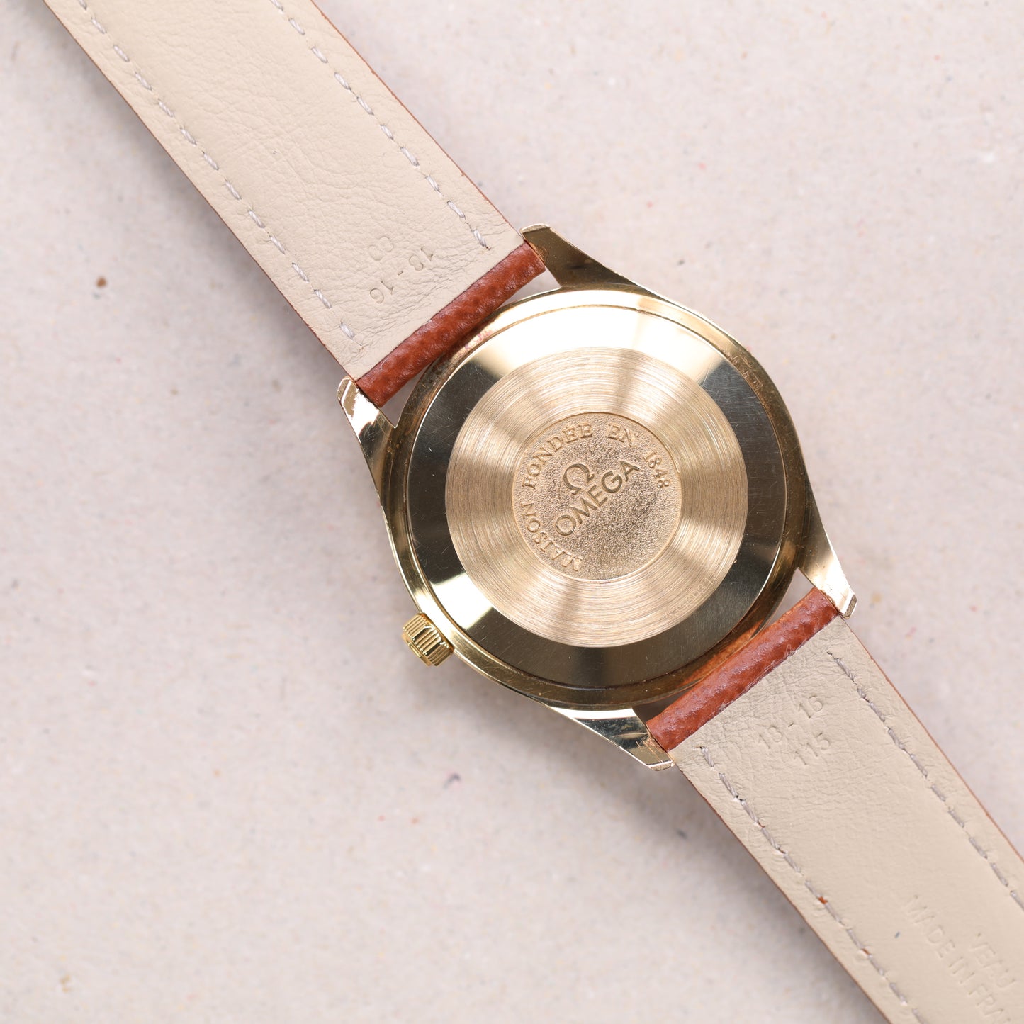 Omega Speedmaster | 1660.285 | 35 mm | 1991 | Cadran blanc | Boite & Papiers | Or jaune