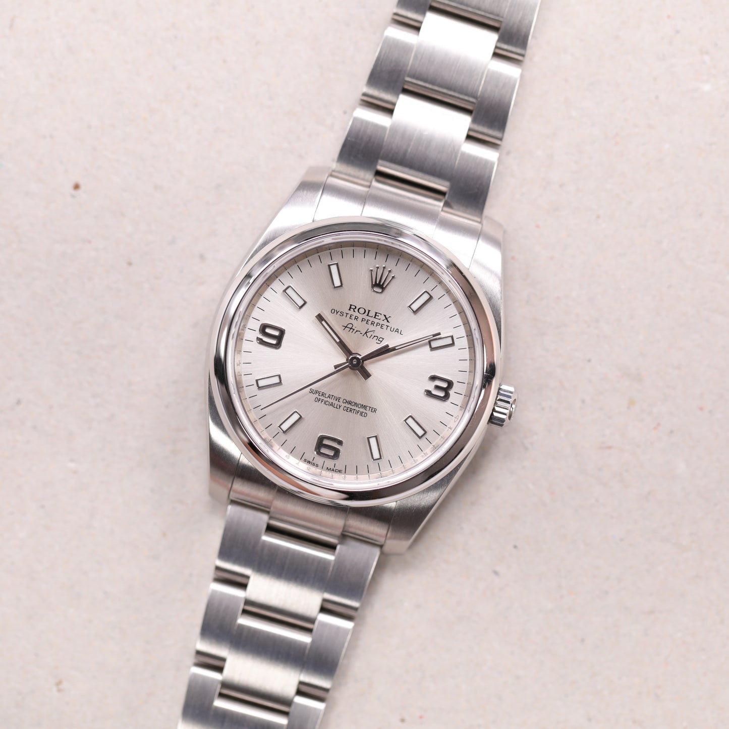 Rolex 114200 | 34 mm | 2012 | Cadran argent | Boite & Papiers | Acier