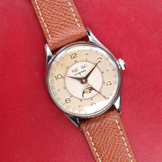 Leonidas Triple Date Moon Phase | 35 mm | CIRCA 1950 | Acier