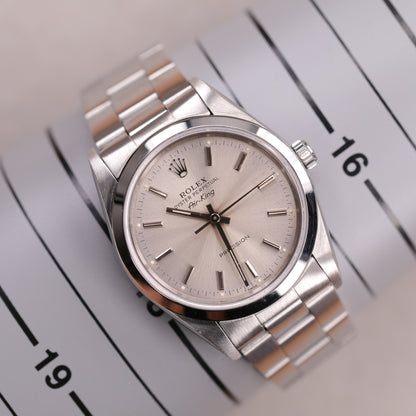 Rolex 14000 | 34 mm | 1991 | Cadran argent | Carte de service Rolex | Acier