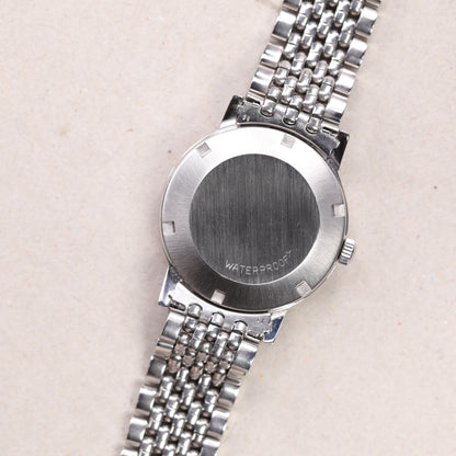 Omega Genève  166.070 | 35mm | 1971 | Cadran argent | Acier