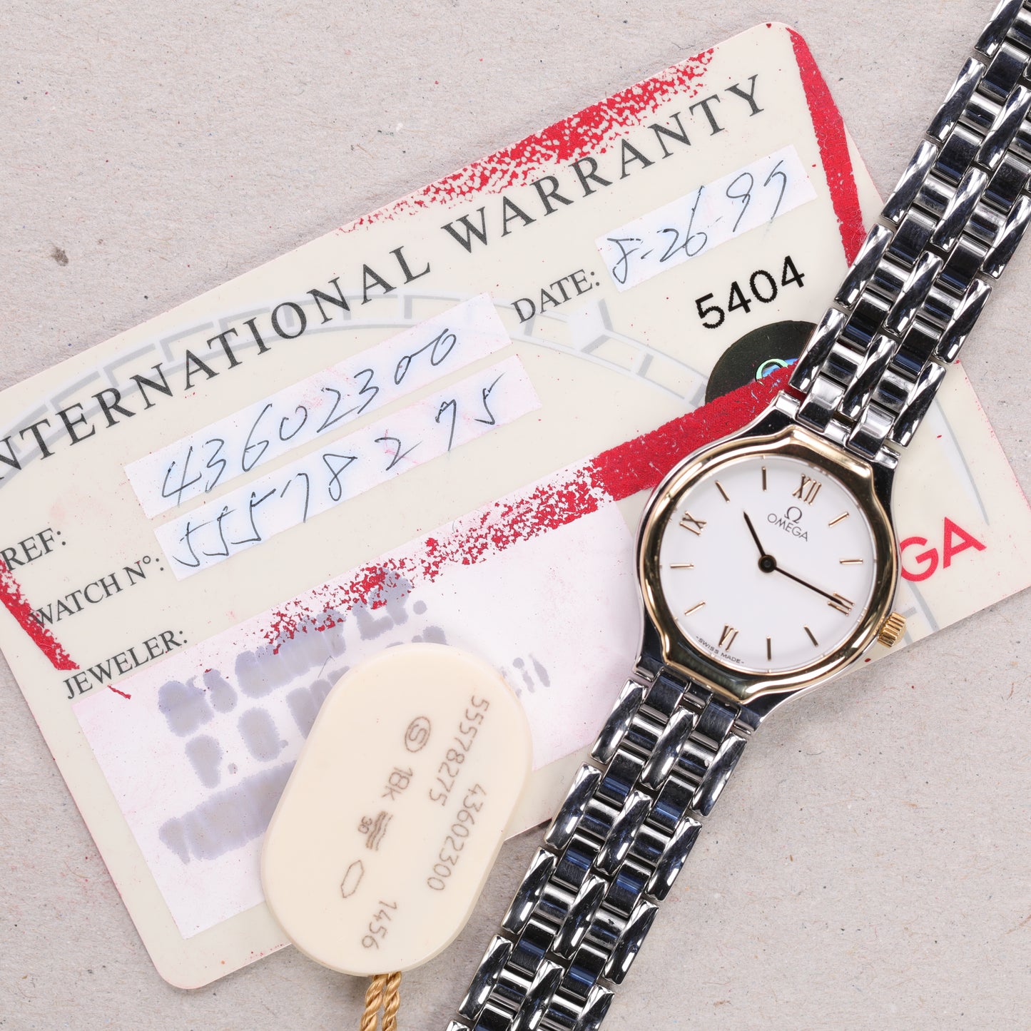 Omega 4360.23.00 | 23,5 mm | 1995 | Cadran blanc | Boite & Papiers | Or / Acier