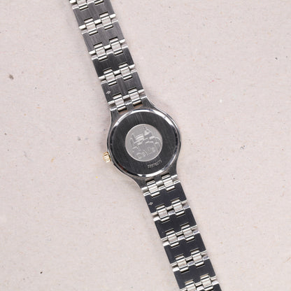 Omega 4360.23.00 | 23,5 mm | 1995 | Cadran blanc | Boite & Papiers | Or / Acier