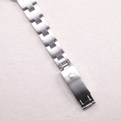 Rolex 76080 | 26 mm | 2002 | Cadran argent | Boite & Papiers | Acier