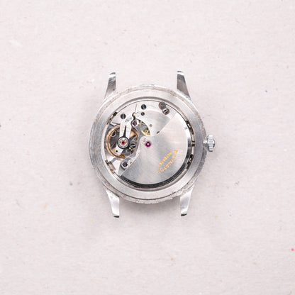 Leonidas Triple Date Moon Phase | 35 mm | CIRCA 1950 | Acier