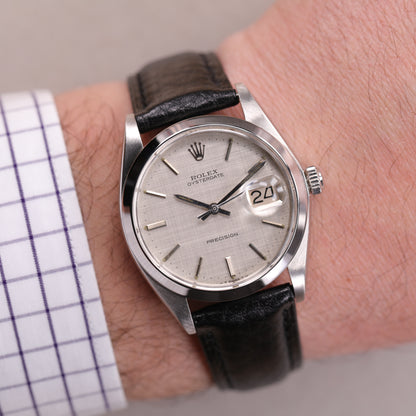 Rolex 6694 | 34 mm | 1974 | Cadran argent texturé lin | Acier