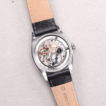 Rolex 6494 | 34 mm | 1956 | Cadran noir | Acier