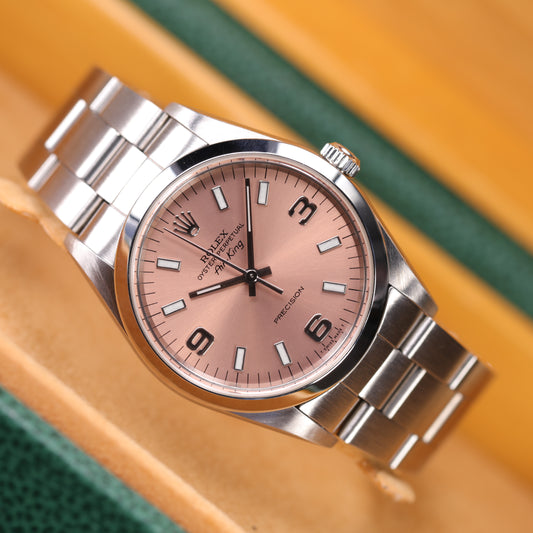 Rolex 14000 | 34 mm | 1999 | Cadran rose | Écrin Rolex | Acier