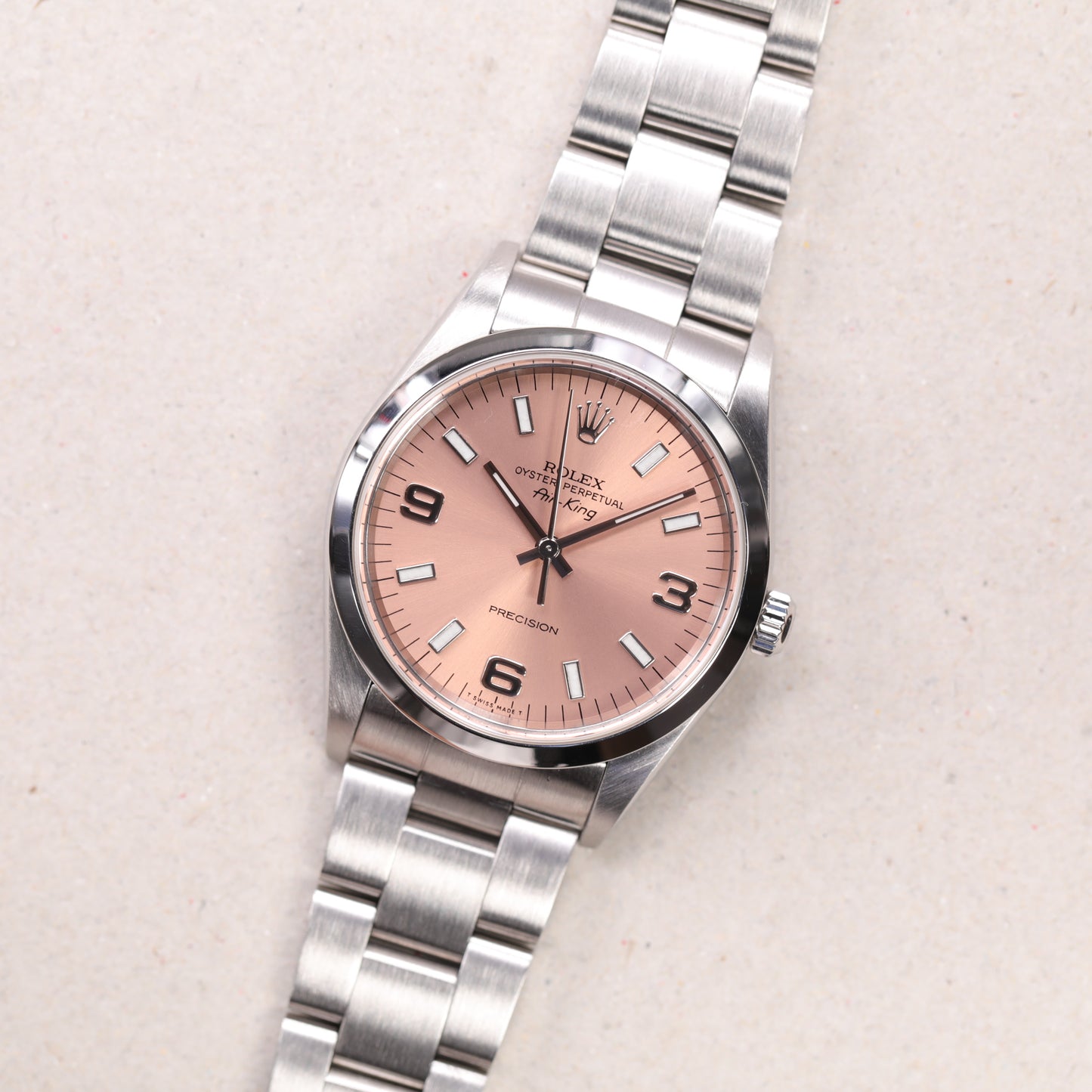 Rolex 14000 | 34 mm | 1999 | Cadran rose | Écrin Rolex | Acier