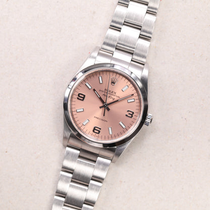 Rolex 14000 | 34 mm | 1999 | Cadran rose | Écrin Rolex | Acier